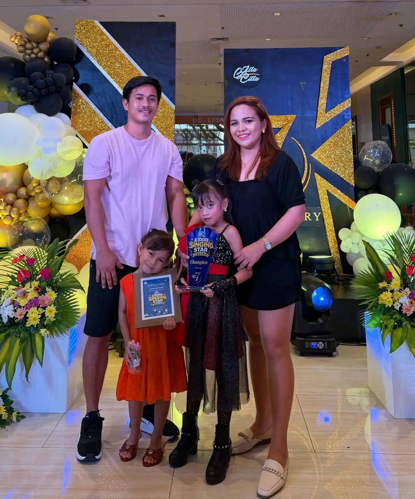 Jilean Shain Ocmeja Taghap with her supportive family